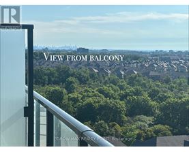 A view from a balcony overlooking a residential area.