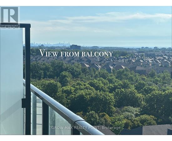 A view from a balcony overlooking a residential area.