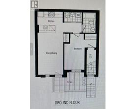 A floor plan of a house with a kitchen, living/dining area, bedroom, and bathroom.