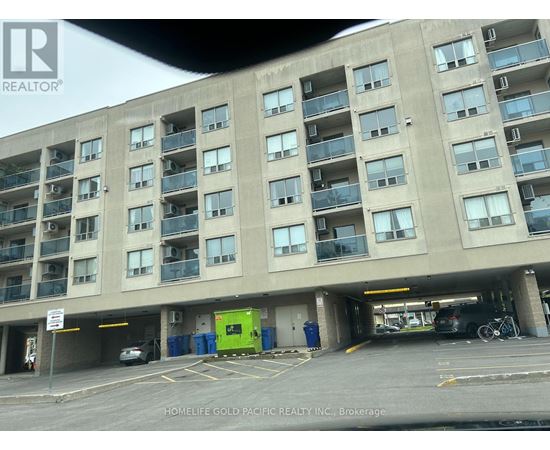 A parking garage with a sign that says REALTOR.