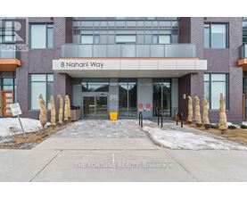 The front of a building with the name Nahani Way on it.