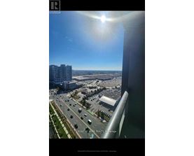 A sunny day in a city with a clear blue sky.