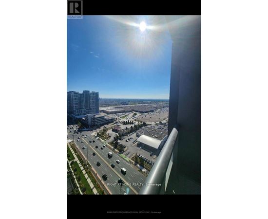 A sunny day in a city with a clear blue sky.