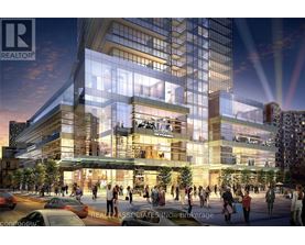 A modern building with a glass facade and the words "REALTOR" and "REAL ESTATE AGENTS INC." on it.