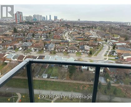 A view from a balcony of a residential area with the text "EXP REALTY, Brokerage" on the railing.