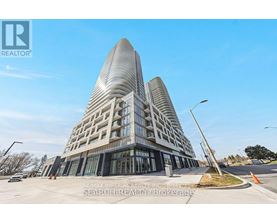 A modern building with a curved facade is the focal point of the image.