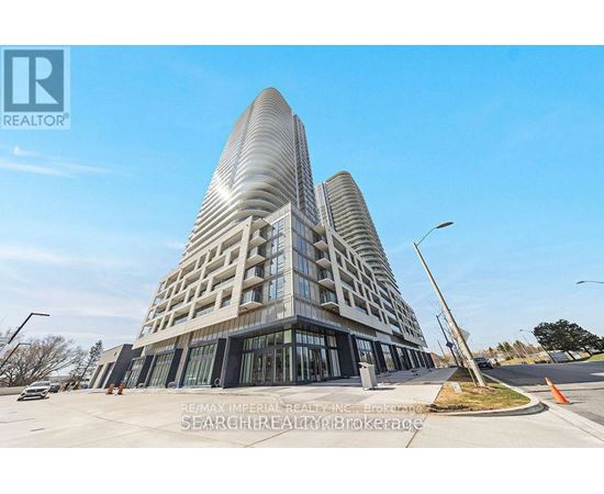 A modern building with a curved facade is the focal point of the image.
