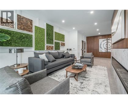 A living room with a grey couch and a coffee table.