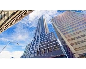 A tall building with the words Pay Street Group Inc. Brokerage on it.