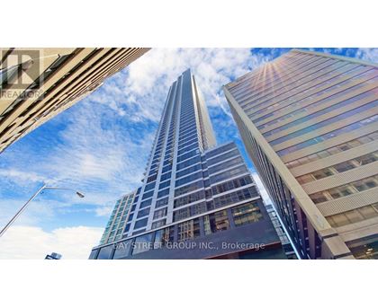A tall building with the words Pay Street Group Inc. Brokerage on it.
