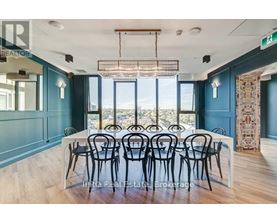 A dining room with a table set for six with a view of the outside.