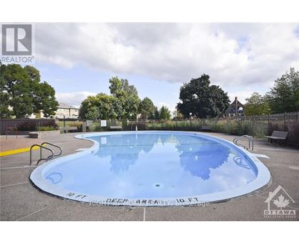 A swimming pool with the text "B.T. NORTHAMPTON" on the side.