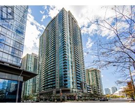 A tall building with the words "REMAX PARADIGM REAL ESTATE" on it.