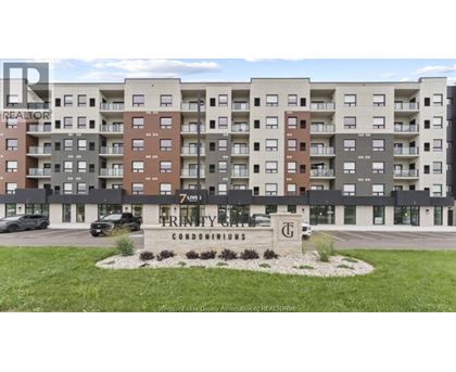 A building with the words "Prinity Condominiums" on the front.