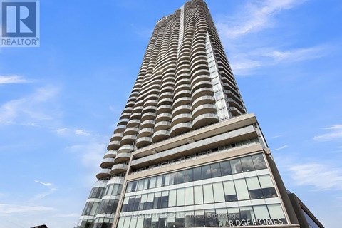A tall building with a sign that reads "Wardge Homes".