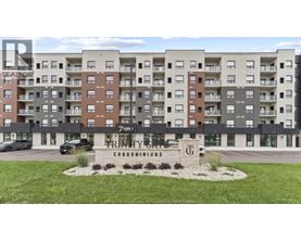 A building with the words "Prinity Condominiums" on the front.