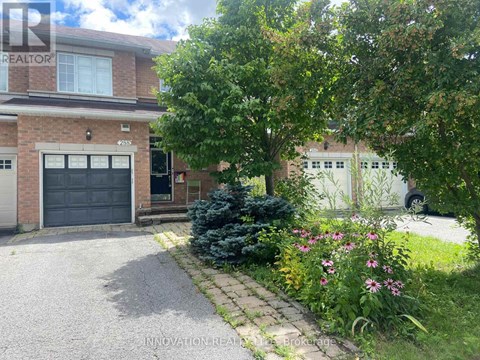 A house with a driveway and a garage door.