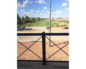 A view from a window looking out at a construction site.