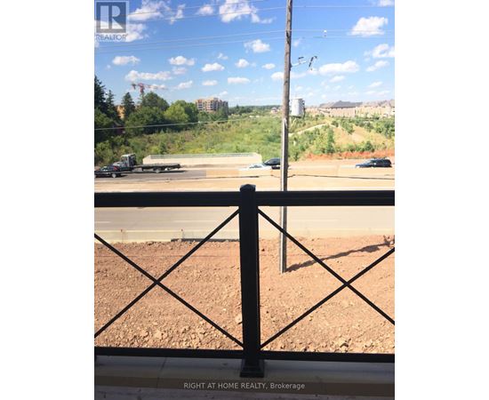 A view from a window looking out at a construction site.