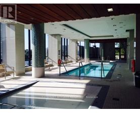A pool area with a sign that says REALTOR.