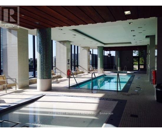 A pool area with a sign that says REALTOR.
