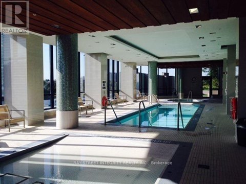 A pool area with a sign that says REALTOR.