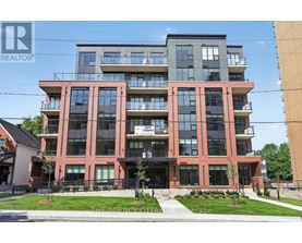 A multi-story building with a sign that reads "REALTOR" on the front.
