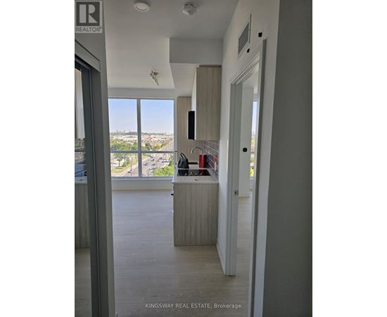 A real estate office with a view of the city.