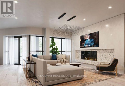 A modern living room with a large couch, a fireplace, and a painting on the wall.