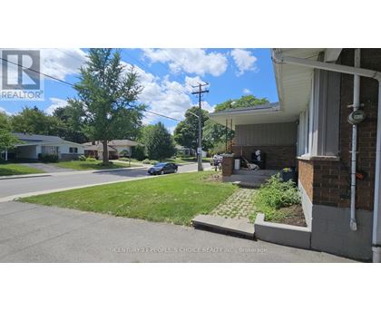 A realtor company logo is on the top left corner of the image.