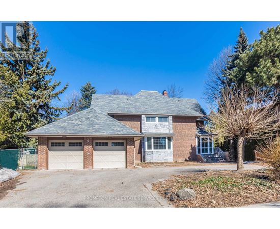 A house with a garage is for sale.