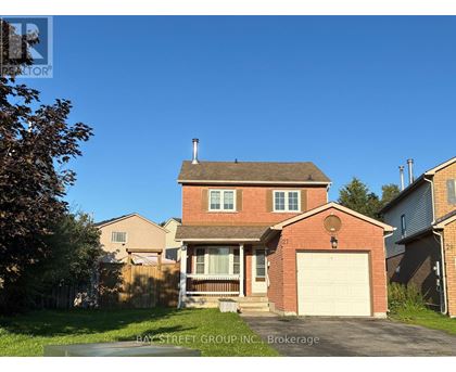 A house with a garage is for sale by Bay Street Group Inc.