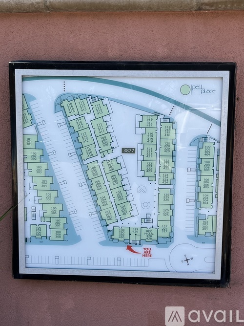 A framed map of a residential area with street names and house numbers.