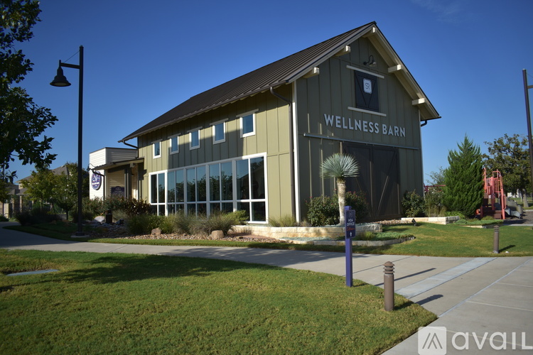 A building with the words "Wellness Barn" on it.