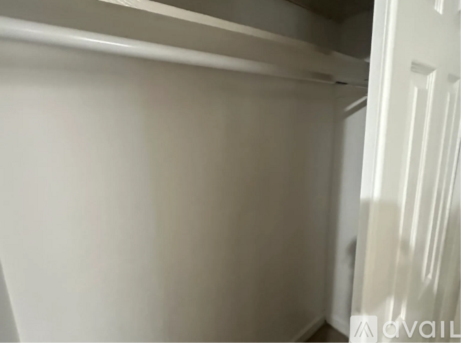 A white door is on the right side of the image.