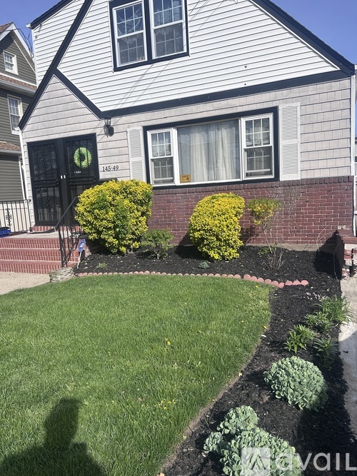 A house with a green wreath on the door.