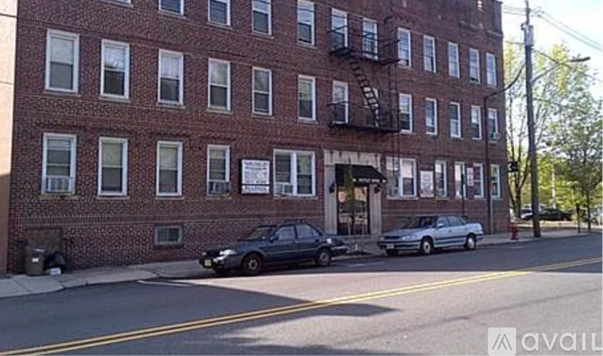 A brick building with a fire escape on the side.