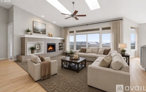 A living room with a fireplace and a couch.
