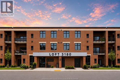 The image shows a building with the name LOFT 3180 on it.