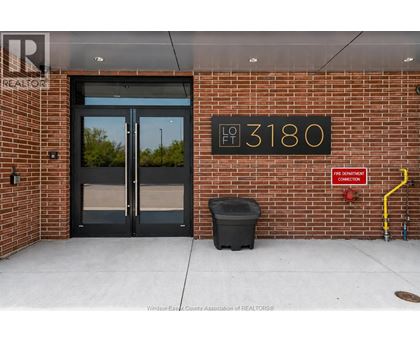 The front of a building with a sign that says 3180.
