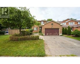 A residential area with a house and a garage.