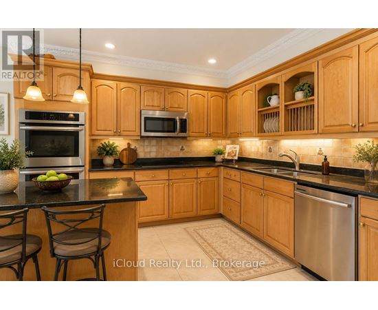 A kitchen with wooden cabinets and a black countertop.