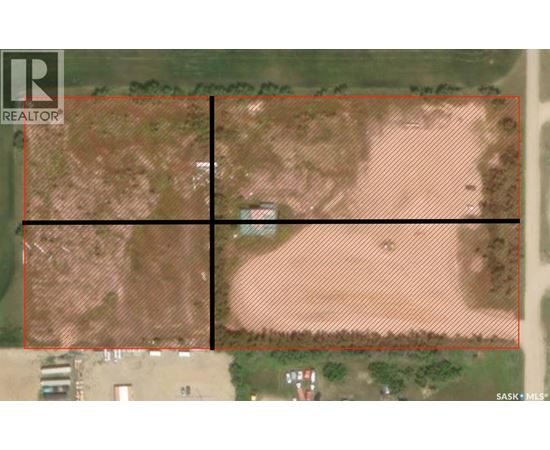 A satellite image of a property with a red line in the middle.