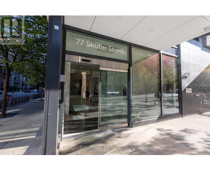 The image shows the front of a building with the address 77 Shuter Street.
