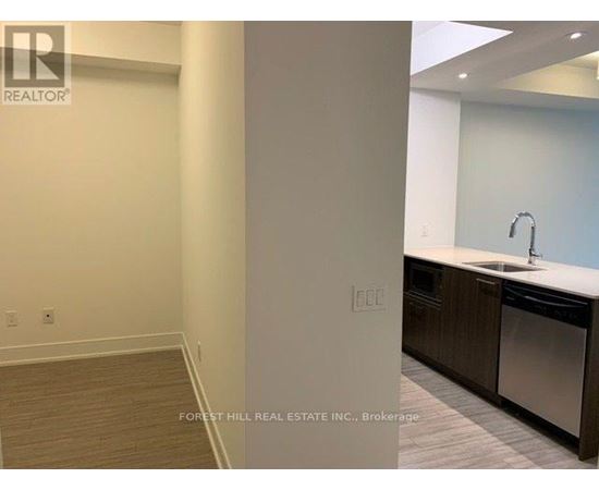 A kitchen area with a sink and a dishwasher.