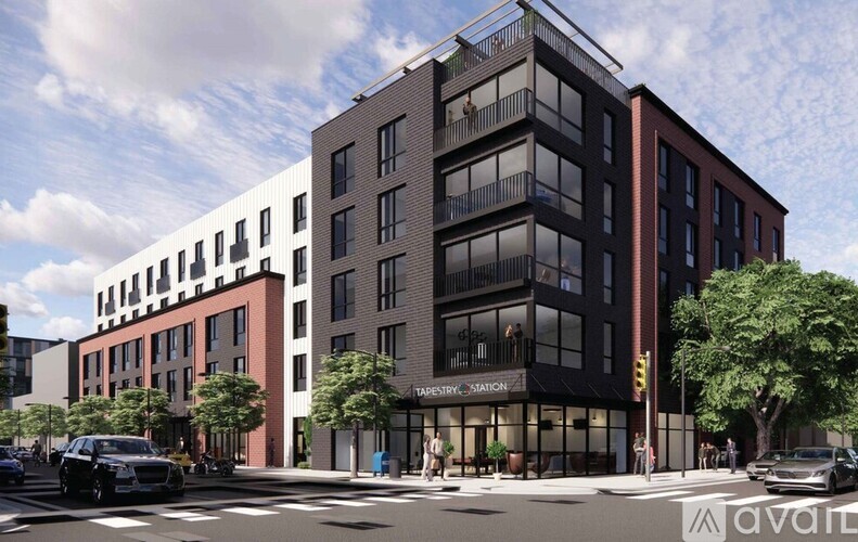 A rendering of a modern apartment building with a glass facade and balconies.