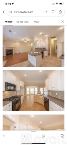 A real estate website is open on a mobile device, displaying images of a modern kitchen and living room.