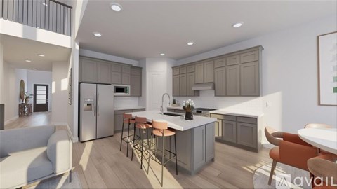A modern kitchen with a dining table and chairs.