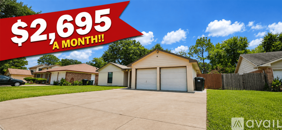 A house with a red banner stating "$2,695 A MONTH!!!" is for sale.