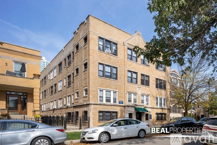 A building with the text BEALPROPERTIES on the front.